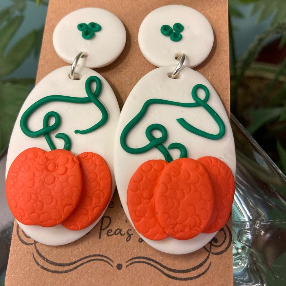 White dangles with textured Fall Pumpkins
